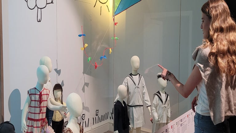 Volunteer working in the fashion department at Killerton